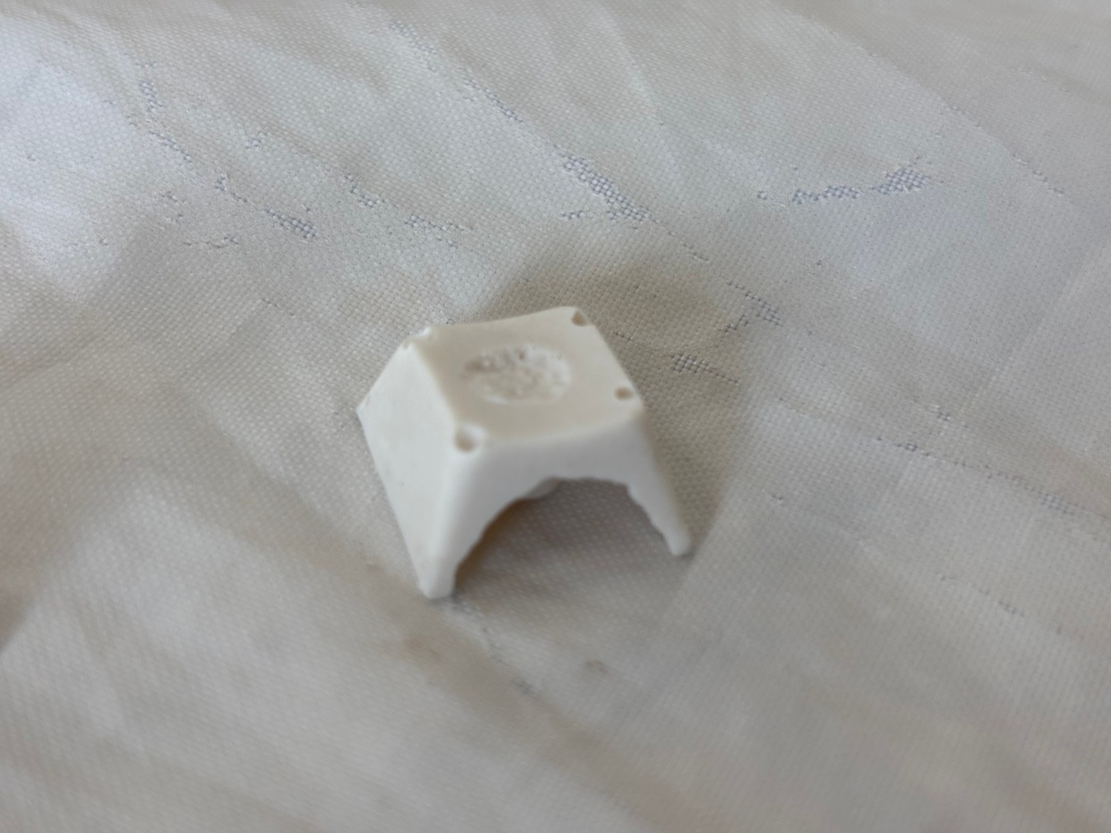 Cast keycaps before firing